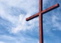 a brown wooden cross
