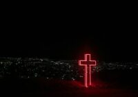 red neon light cross signage