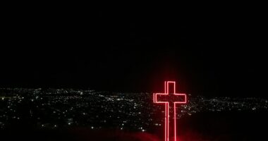 red neon light cross signage
