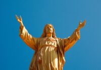 gold statue of a man