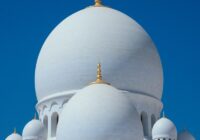 white concrete dome building under blue sky during daytime