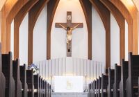 crucifix statue on wall