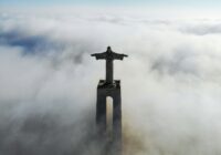 Christ Redeemer covered with clouds at daytime
