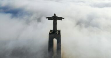 Christ Redeemer covered with clouds at daytime